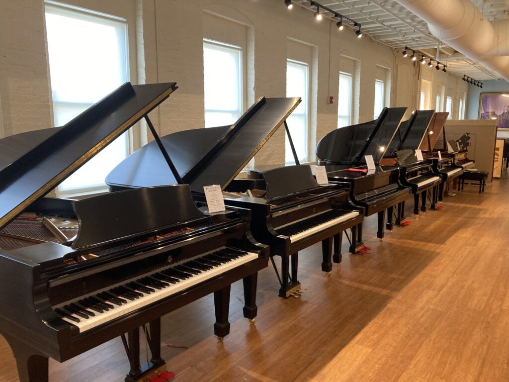 Row of New Steinways at M. Steinert & Sons