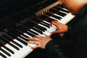 Photo of pianist playing Yamaha keyboard