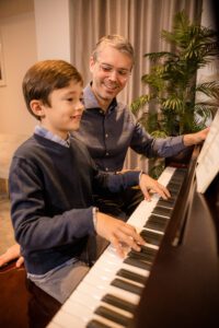Father and son at the keyboard