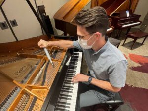 A Steinway-trained piano technician