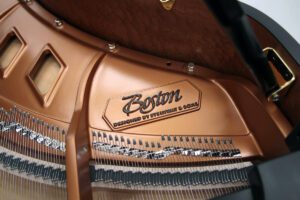 Boston piano plate and logo