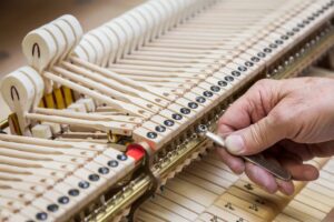 Regulating a piano's action